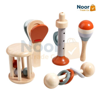Close-up of the wooden shaker and bell clapper from the Montessori sensory training musical set